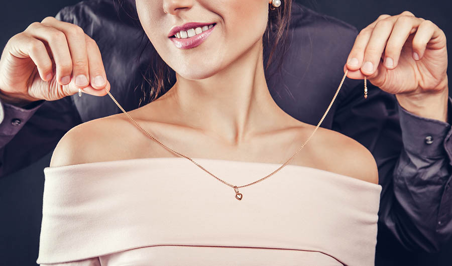 woman wearing gold jewellery